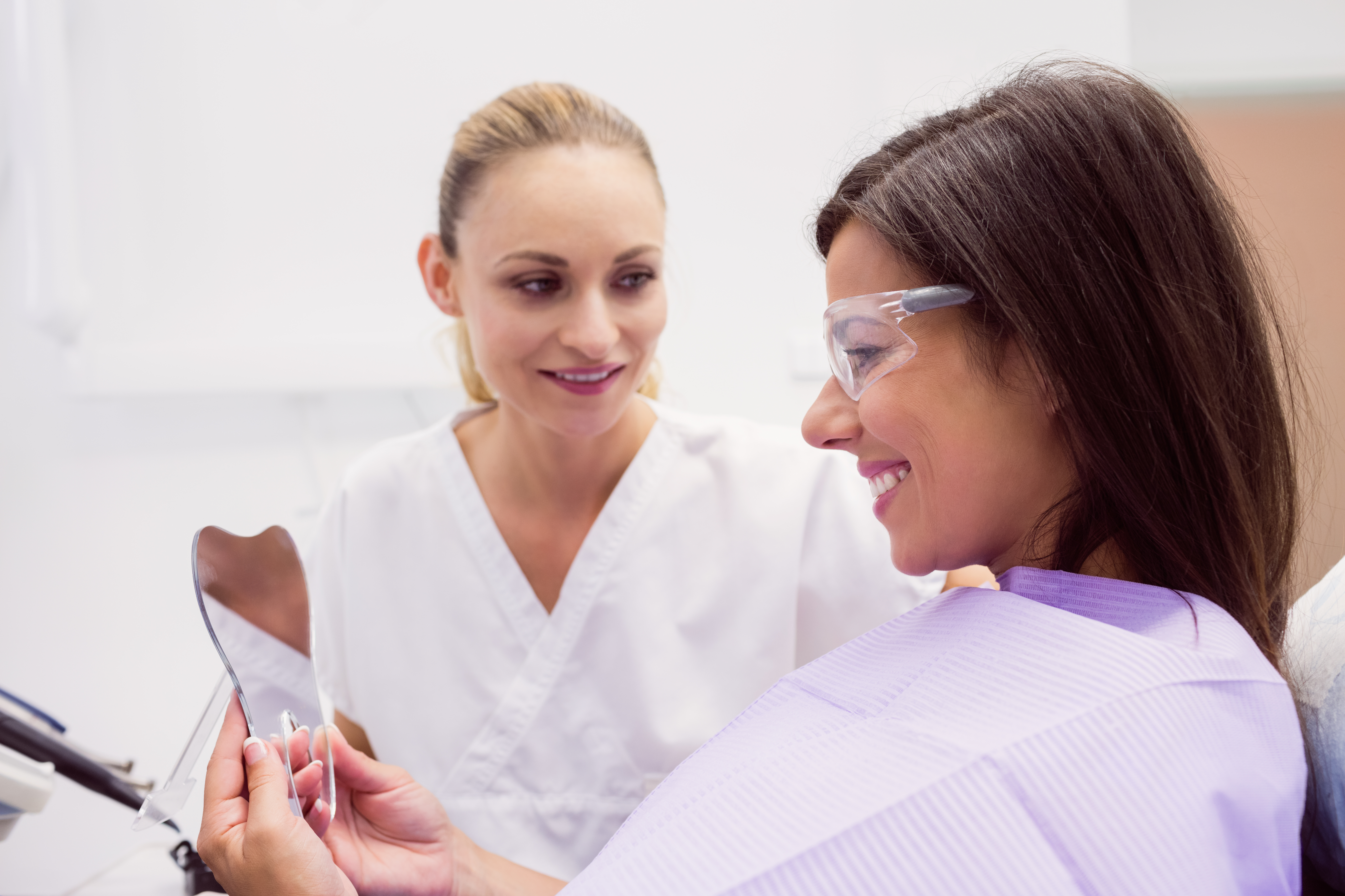 <a href="https://www.freepik.com/free-photo/female-patient-smiling-while-looking-mirror_8404327.htm#fromView=search&page=3&position=39&uuid=616ac6a8-aa85-47df-b324-50eb3392193d&query=digital+smile+design+dentist+patient">Image by wavebreakmedia_micro on Freepik</a>